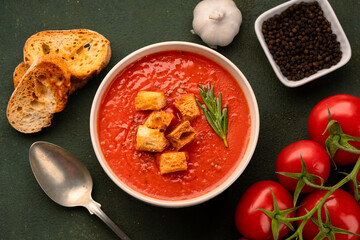 Homemade tomato soup on vintage table
