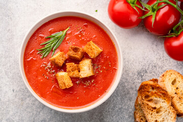 Homemade tomato soup on vintage table
