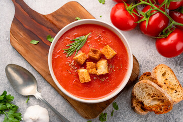 Homemade tomato soup on vintage table