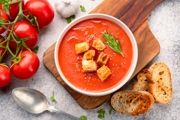 Homemade tomato soup on vintage table