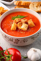 Homemade tomato soup on vintage table