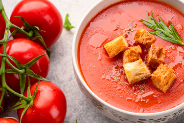 Homemade tomato soup on vintage table