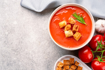 Homemade tomato soup on vintage table