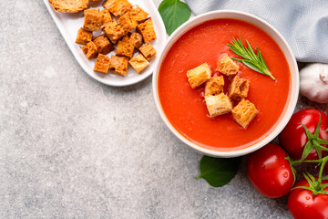 Homemade tomato soup on vintage table