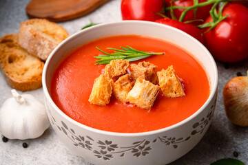 Homemade tomato soup on vintage table