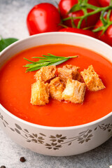 Homemade tomato soup on vintage table