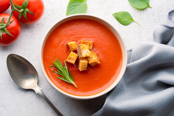 Homemade tomato soup on vintage table