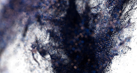 Dramatic dark blue particles explode, creating an abstract, high-resolution background.