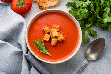 Homemade tomato soup on vintage table