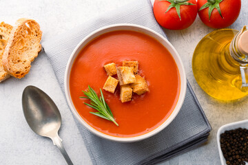 Homemade tomato soup on vintage table