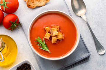 Homemade tomato soup on vintage table