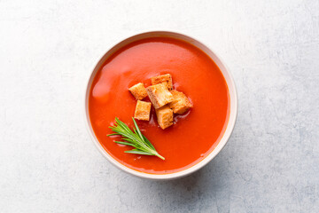 Homemade tomato soup on vintage table