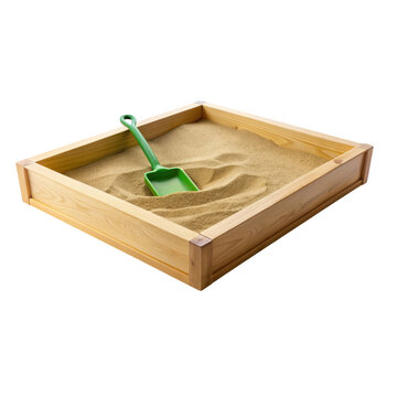 A wooden sandbox filled with sand and a green plastic shovel placed inside.