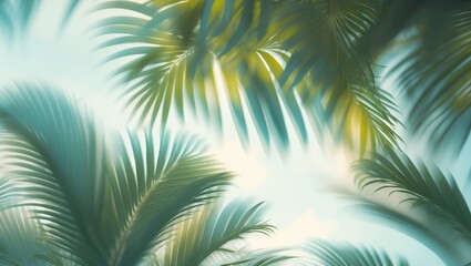 Obraz premium Tropical leaves background with an abstract blur pattern.