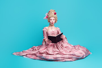 Photo of lovely charming lady princess british queen wear pompous dress sit floor read book...