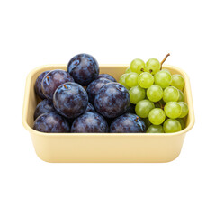 Ripe plums and green grapes arranged in a yellow container, ready to be enjoyed fresh