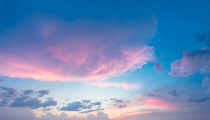 sky in the pink and blue colors effect of light pastel colored of sunset clouds cloud on the sunset sky background with a pastel color