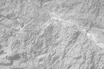 Empty light grey stone wall on cave surface for abstract background and texture. Template for design, natural patterns, space for work, banner,seamless wallpaper, close up.