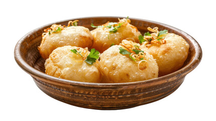 A close-up of crispy, golden-brown Indian snacks served in a rustic bowl, garnished with herbs