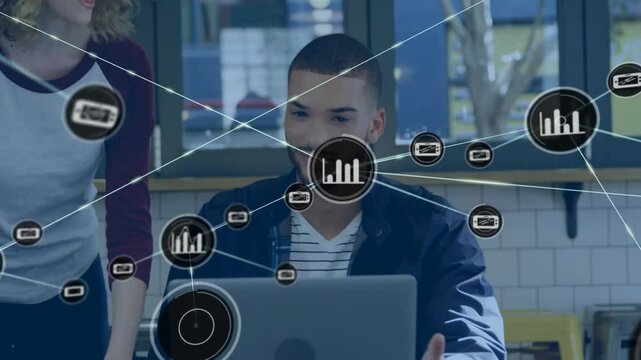 Node appearing above laptop screen causing chart icons forming web as colleagues collaborating tech