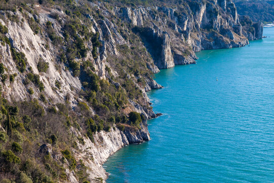 Duino, Italy - January 11, 2025: The coastline profile seen from the castle.