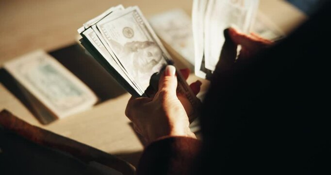 Hands, counting or cash for illegal business, money laundering and investment scam in crime syndicate. Above, bank notes and closeup of person with dollars for stealing, corruption and fraud capital