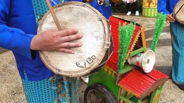Cinematic shot of hands of a young man plays traditional drum instrument&nbsp;called&nbsp;Dohlak.