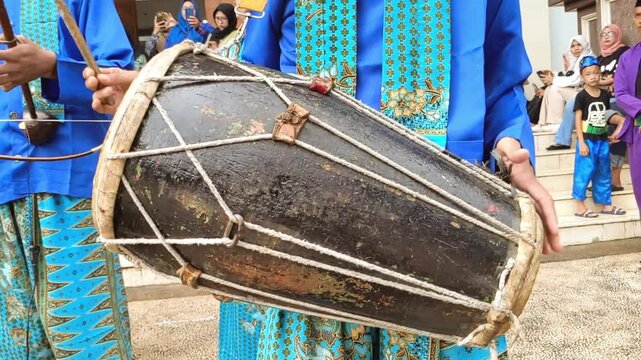 Cinematic shot of hands of a young man plays traditional drum instrument&nbsp;called&nbsp;Dohlak.