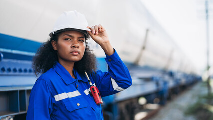 Engineer conducting outdoor railway inspection for natural gas transport and industrial freight...
