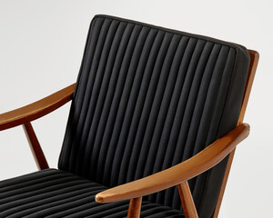 Modern lounge chair exhibiting stylish quilted upholstery and wood frame