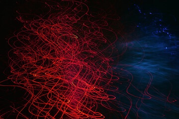Abstract long exposure photography of red and blue light trails