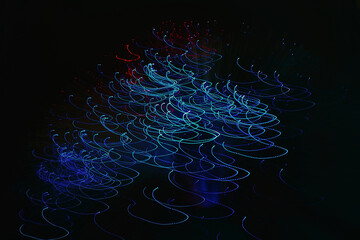 Abstract long exposure photography of blue light trails
