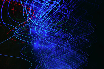 Abstract long exposure photography of blue, red and green light trails