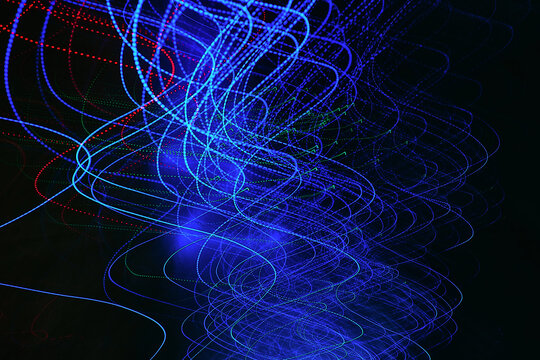 Abstract long exposure photography of blue, red and green light trails