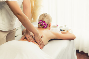 Caucasian woman customer enjoying relaxing anti-stress spa massage and pampering with beauty skin...