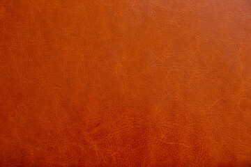 Red leather smooth old as background, leather texture
