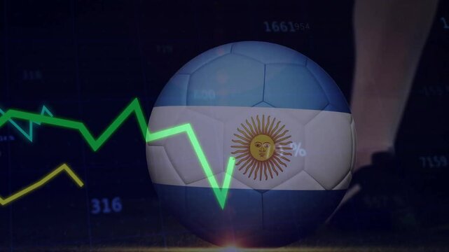 Digital graphs fluctuating across Argentina-flagged ball before cleated foot kicking ball rolling