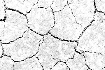 Texture soil dry crack background pattern of drought lack of water of nature white black old broken.