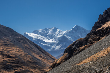 Gangapurna and Annapurna III summits with huge glaciers, view from Thorong high camp. Autumn sunny day in Himalaya mountains, Nepal.