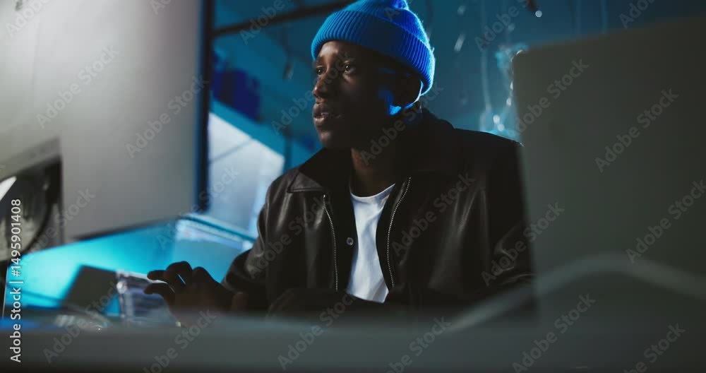 Poster Computer, night and black man coding in office for programming, software update and cybersecurity. Professional, working late and person on pc for website development, networking and AI system
