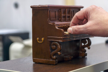 Hand Playing little Toy Piano