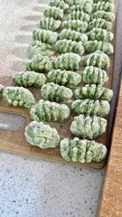 Raw gnocchi with spinach for making lunch 