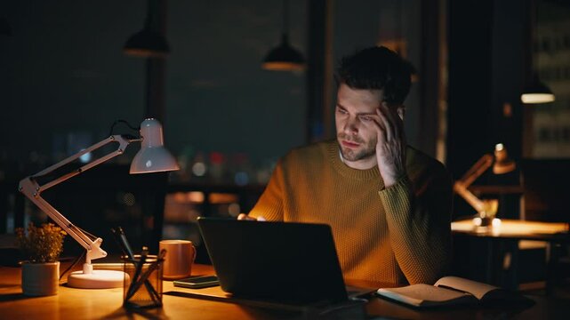 Late worker frustrated mistake online project at night workspace closeup. 