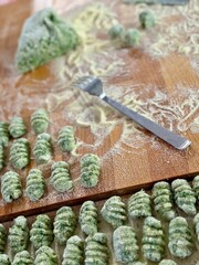 Raw gnocchi with spinach for making lunch 