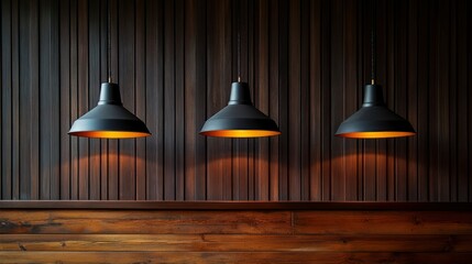 Obraz premium Three Industrial Pendant Lights Hanging Against Dark Wood Wall