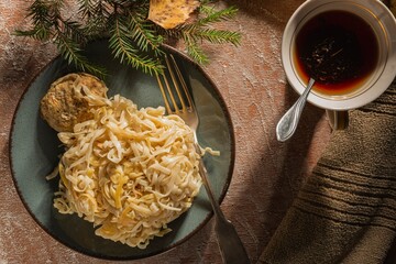 Breakfast on the table. Food and napkin on a dark background. Abstract backdrop
