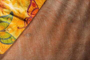 Napkin on an orange background. Magic stage lighting on an abstract backdrop