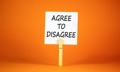 Agree to disagree symbol. Concept words Agree to disagree on beautiful white paper on wooden...