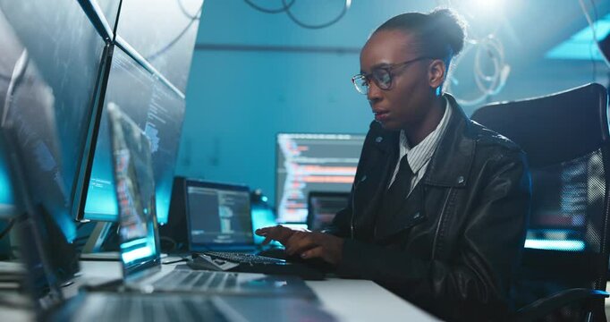 Business, computer and black woman with cyber security, night and thinking with software update. African person, evening or programmer in workplace, pc or research for hacker, coding or IT technician