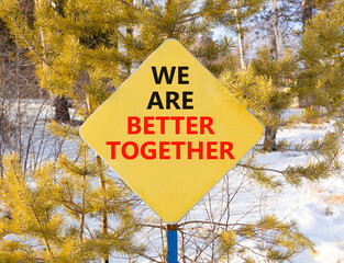 We are better together symbol. Concept words phrase We are better together on beautiful yellow road...